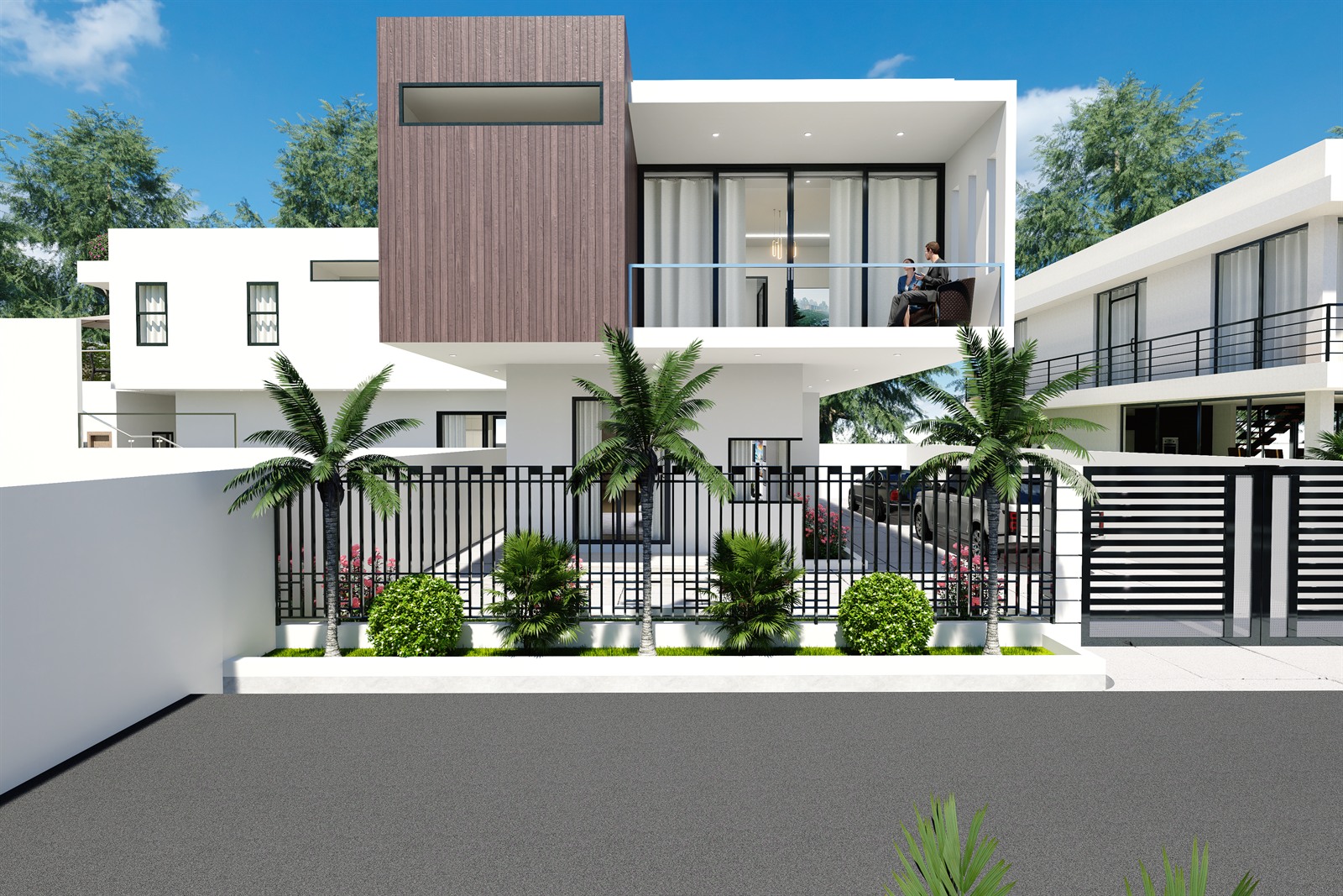 One house from the street: a timber-clad upper box over a glazed living floor, a balcony to the right, and a sliding gate in railings set on a white plinth.