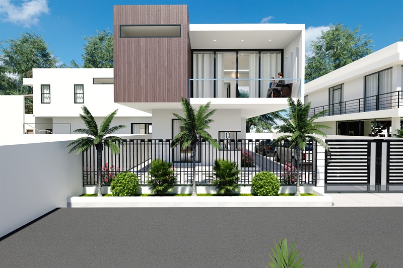 One house at Bridge City Estate from the street: a timber-clad upper box over a glazed living floor, a balcony to the right, and a sliding gate in railings set on a white plinth.