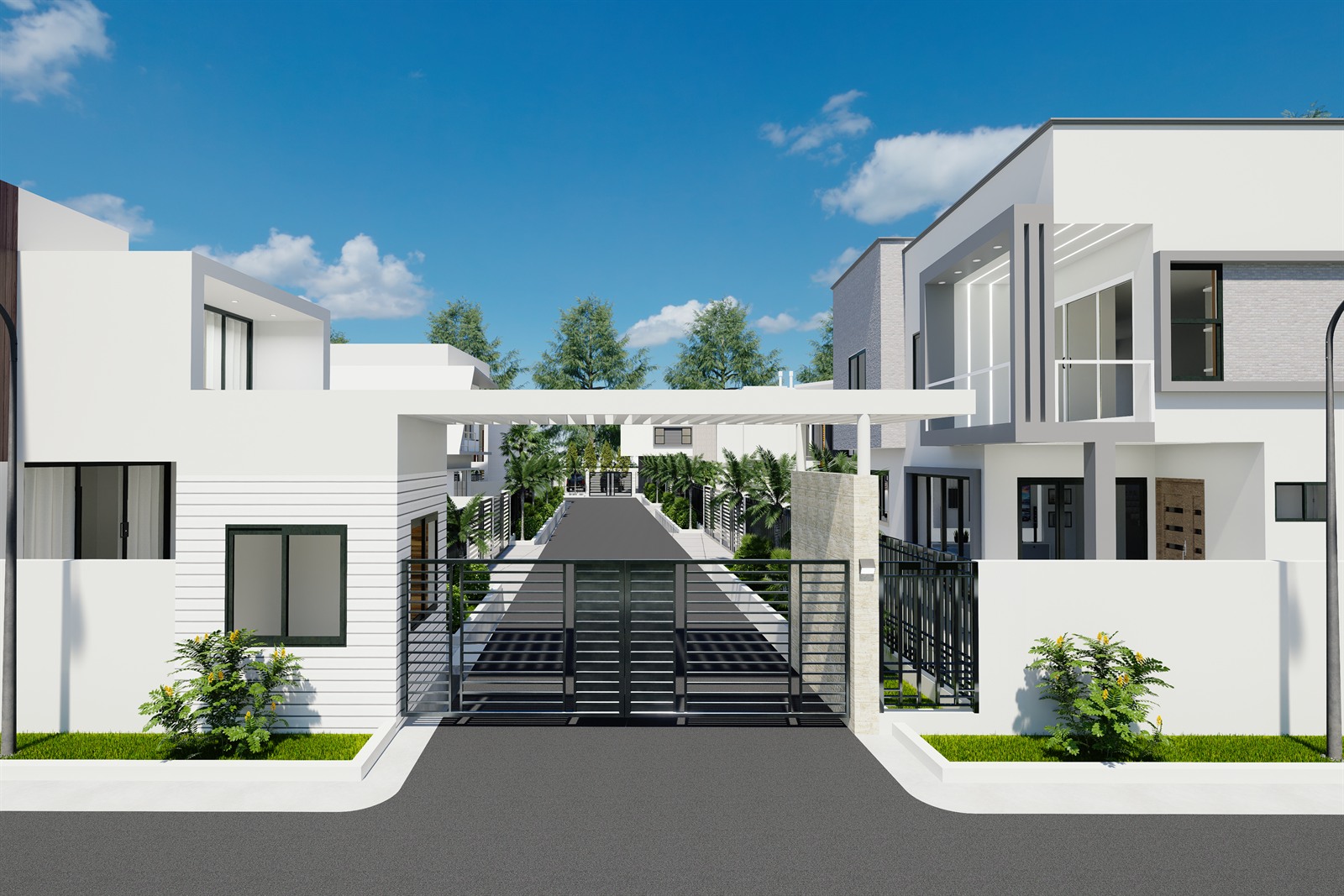 Bridge City Estate: the entrance gate, with the internal street and its palms running away behind it.