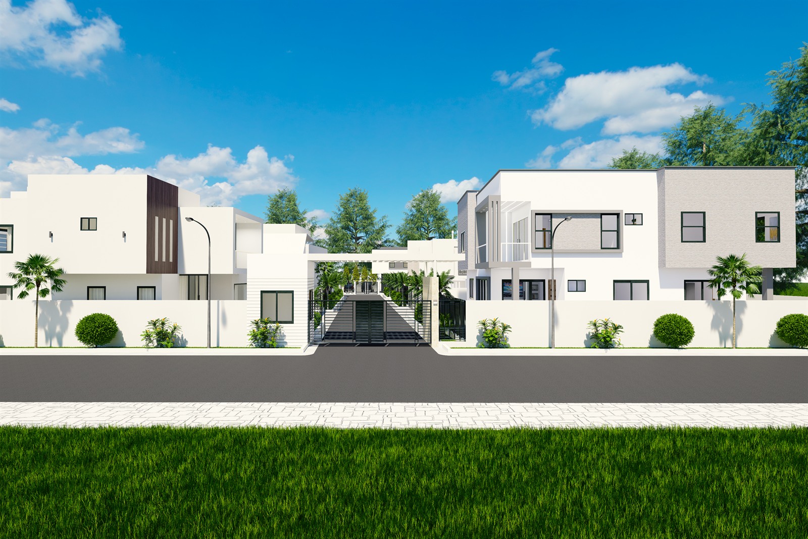 The estate from across the public road: the whole street frontage, the gated entrance on axis in the middle with the internal street running away behind it, houses either side above a white boundary wall, and a grass verge in the foreground.