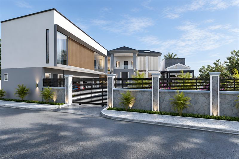 Project Onyx from the road: a timber-clad upper bay over a covered carport, a slatted gate, and a stone-faced boundary wall lit from below.