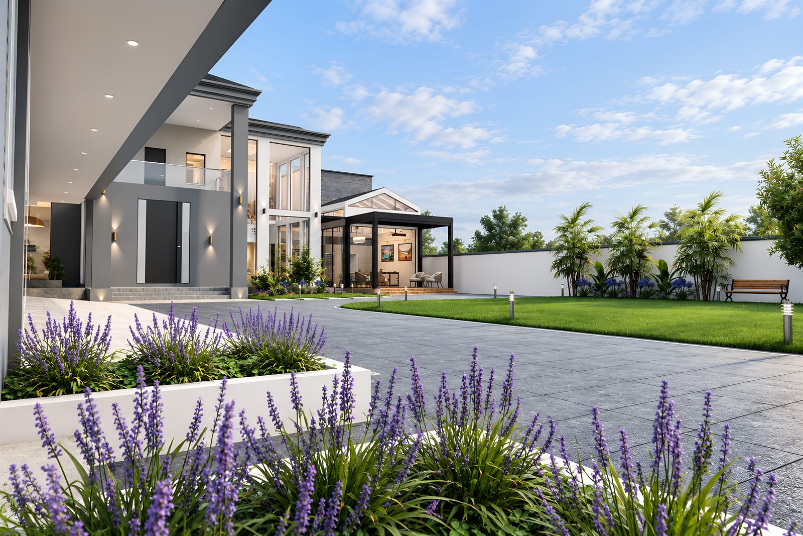The compound from inside the gate: a canopy overhead, the entrance and a glazed garden pavilion beyond, lawn to one side and lavender in raised white planters along the drive.