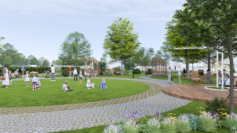 Urban Green Retreat, the Sensory Garden: the lawn in use, with the cobbled path curving through it, timber pods behind and a raised timber deck to the right.