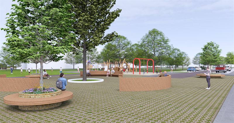 Curved seat walls in brick with timber tops around raised planters, a tree in a circular planter with flowers at its base, setts paving, and a playground beyond with a red swing frame and timber climbing structures.