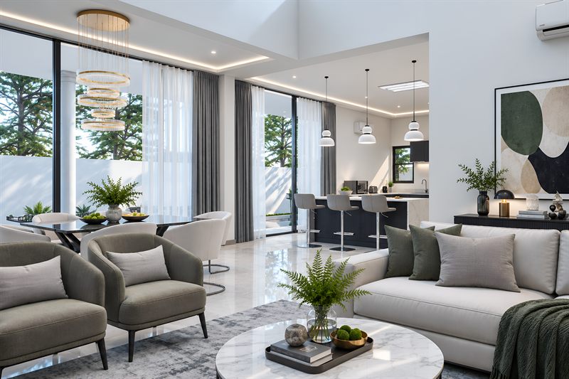 The living and dining space, with armchairs and a dining table in front of full-height curtained glazing and the kitchen island beyond.