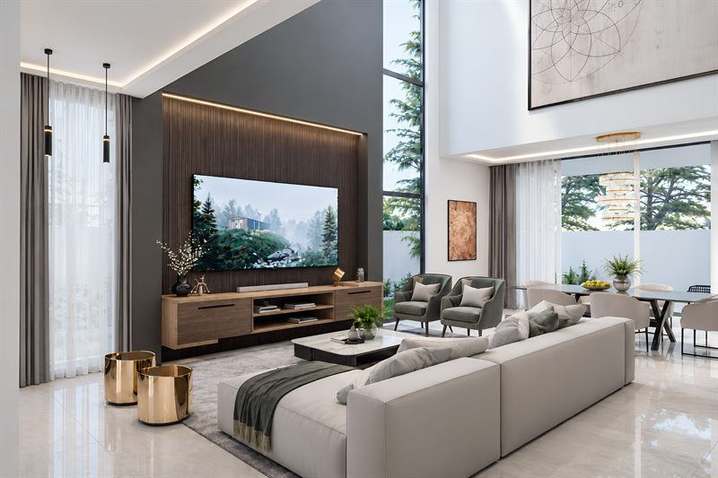 The double-height lounge, with a dark timber media wall facing a corner sofa and glazing to the garden on both sides.