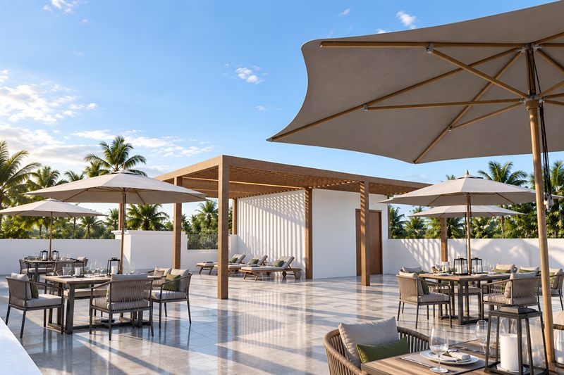 The roof level: timber dining tables with woven chairs under cream parasols, loungers under a timber pergola beside a white pavilion with a slatted screen, and palms over the white parapet.